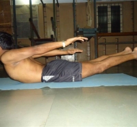 18.SALABHASANA