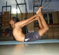 19.DHANURASANA